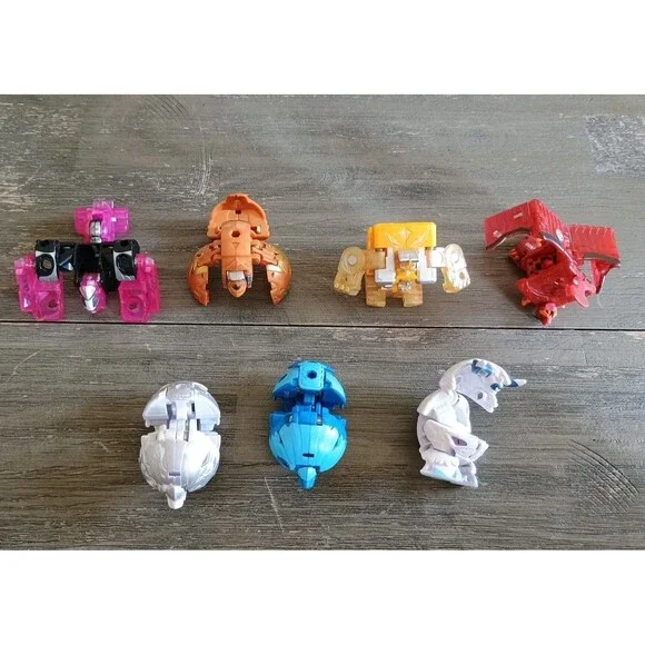 Bakugan Battle Brawlers Lot Of 7 B1000 B300 B400 B2800 B1900 B800 - Picture 1 of 6